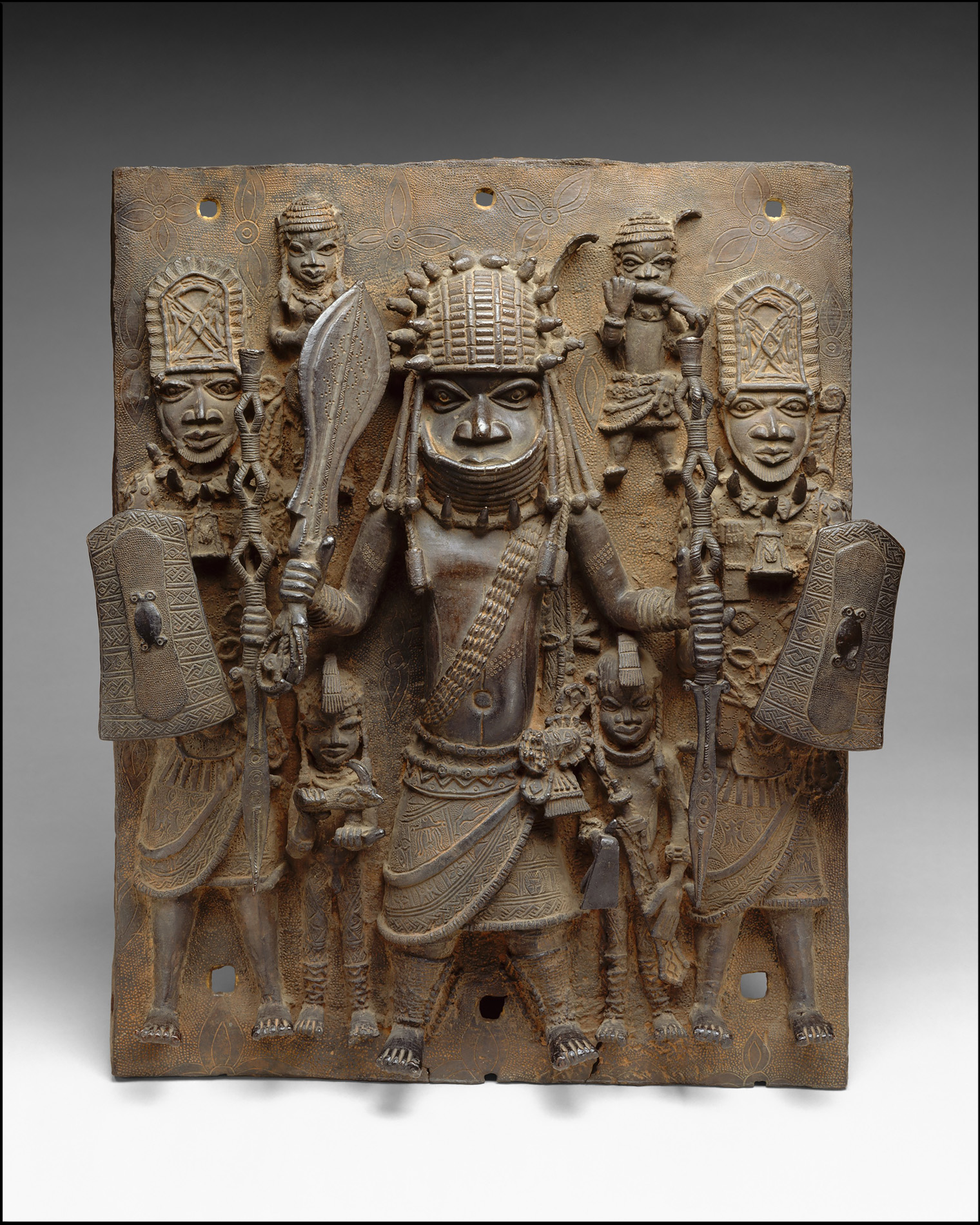 Warrior and Attendants | 16th century West African bronze plaque from the royal palace in Benin City | Metropolitan Museum of Art