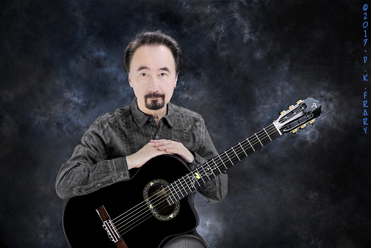 Takamine Guitar | Audio amplifiers and microphones made it possible for soft instruments to be heard in large venues such as concert halls and stadiums. | ©Peter Frary guitar dude